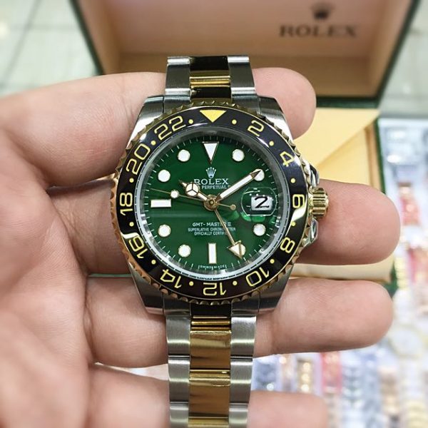 Rolex gmt green dial two tone